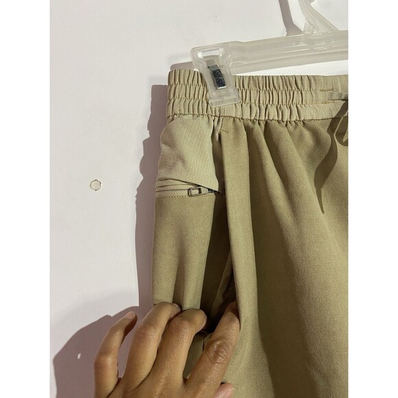 Lululemon License To Train Pant Mens S Tan Tapered Snap Hem Performance Preppy - Picture 4 of 15